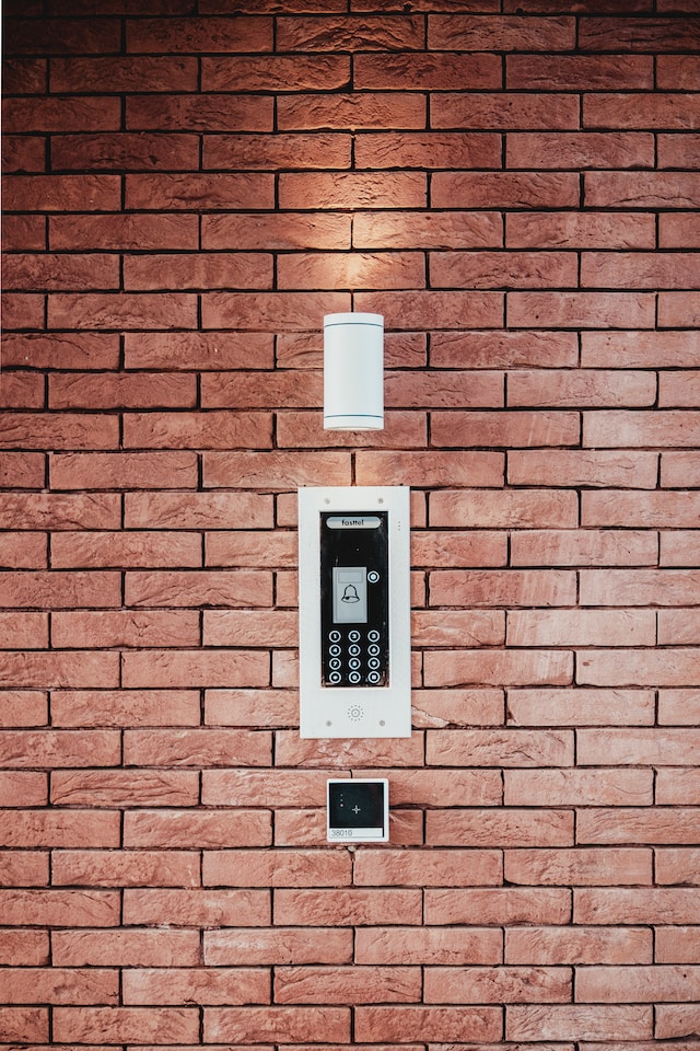 A smart security system on a brick wall