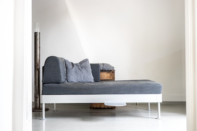 A gray sofa that can also double as a bad