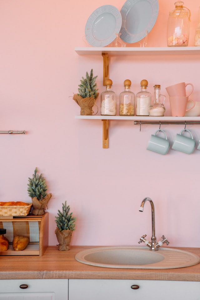 A kitchen wall painted in pastel color